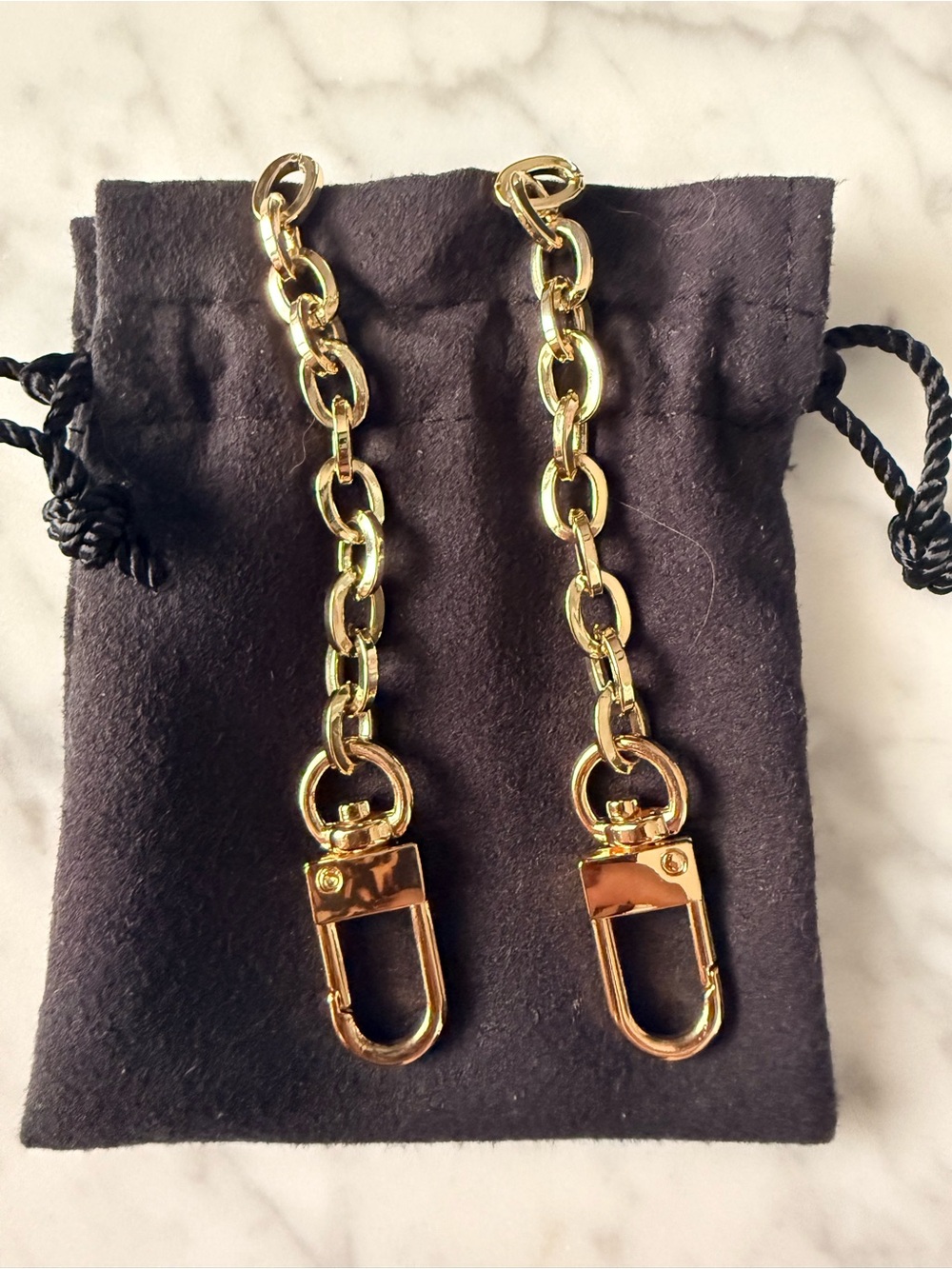 Gold chain extenders for crossbody bags or shoulder bags with gold chain straps